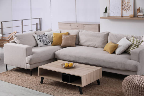 istock Stylish living room interior with comfortable grey sofa and coffee table 1442515862