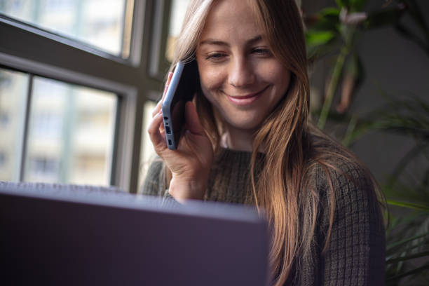 istock Blonde woman works at home. 1442516980