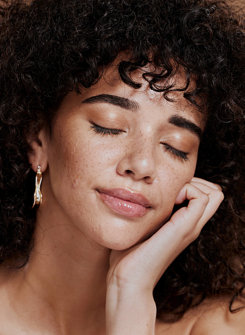 istock Woman, face skincare and makeup with closed eyes for luxury. Wellness or cosmetics microblading aesthetic. African girl, facial care and relax skin glow, natural self care spa and healthy dermatology 1442518366