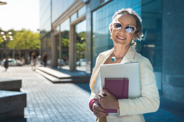 istock Middle-aged confident, focused and powerful business woman looking at camera. 1442518629