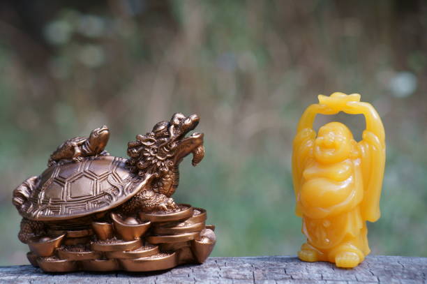 istock Dragon turtle and Buddha figurine. 1442521565