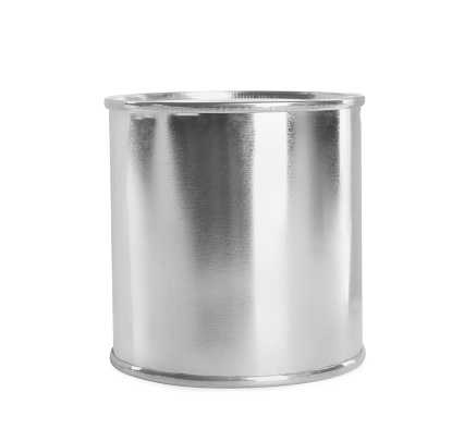 Tin can with boiled condensed milk on white background