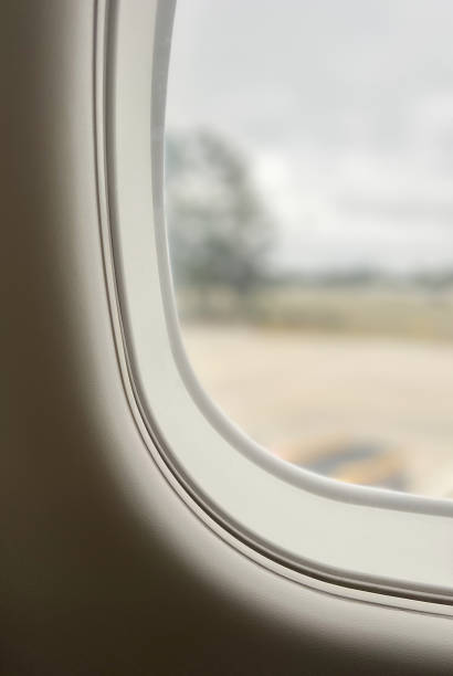 istock Airplane Window on the Ground 1442527434