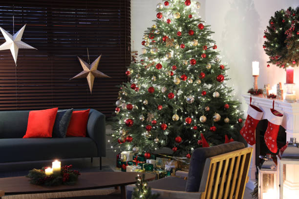 istock Cozy living room interior with beautiful Christmas tree and fireplace 1442528279