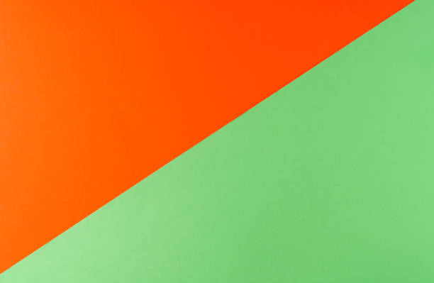 istock Background of bright red and green colors paper, geometric pattern. 1442528937