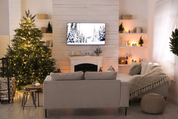 istock Cozy living room interior with beautiful Christmas tree and fireplace 1442529013