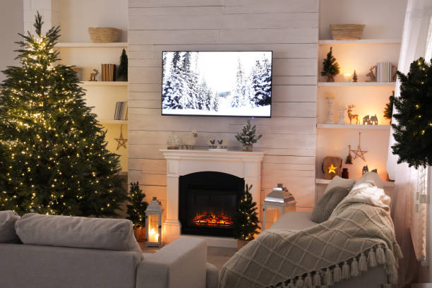 istock Cozy living room interior with beautiful Christmas tree and fireplace 1442531573