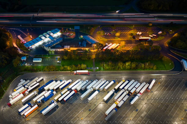 istock Highway and rest area at dusk - aerial view 1442534262