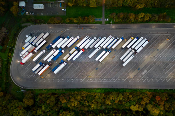 istock Trucks on parking lot - aerial view 1442534563