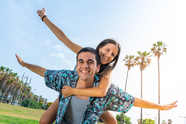 istock Friends smiling having fun outdoor in summer. 1442536830