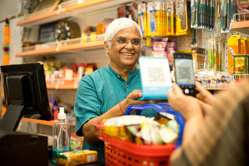 Customer Scanning R Code Customer Scanning Qr Code With Smartphone At Store Stock Photo ...