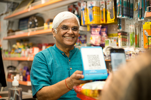 Customer Scanning R Code Customer Scanning Qr Code With Smartphone At Store Stock Photo ...