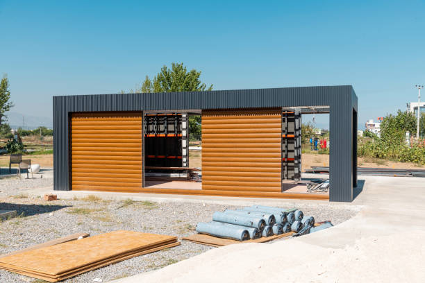istock Newly built metal framed building with siding. Construction of a new tiny house. selective focus 1442544070