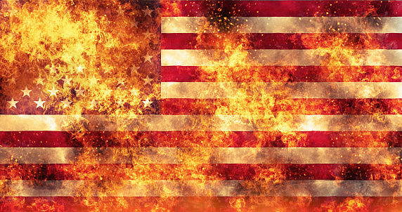 American flag, the Stars and Stripes, burning.