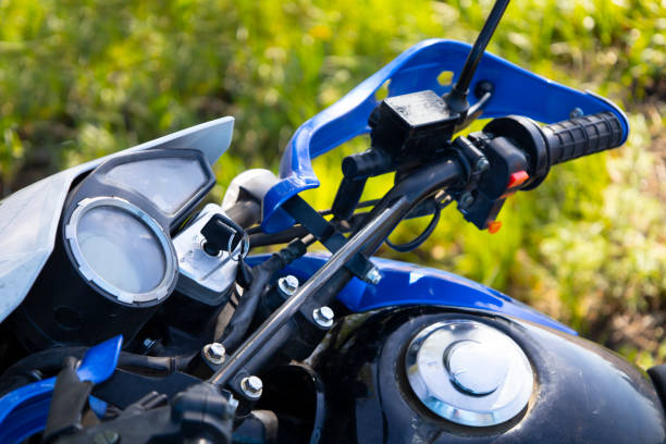 Steering wheel from a subcompact motorcycle close-up. High quality photo