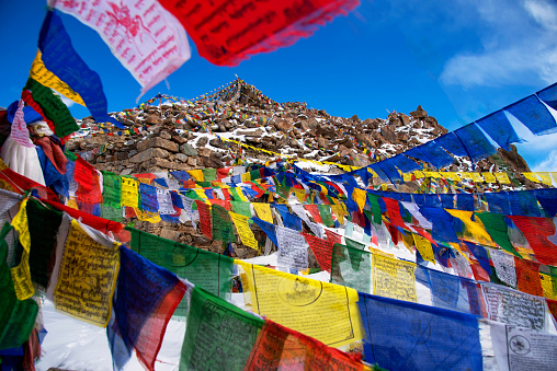 Vintage retro effect filtered hipster style image of Buddhist prayer flags (lungta) in Spiti Valley, Himachal Pradesh, India