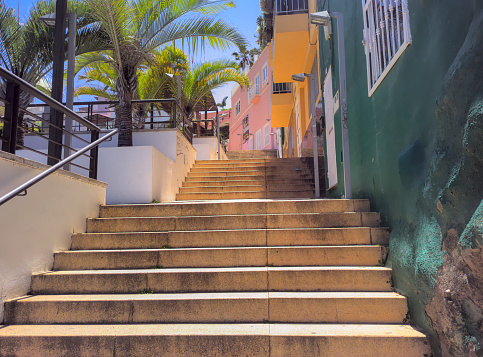 One of the steep streets in Perto de la Cruz on a sunny day. Tenerife, Spain.