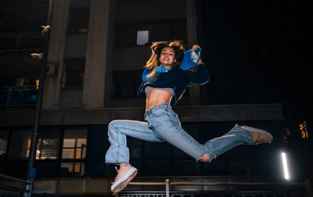 istock Skater girl jumping 1442566612