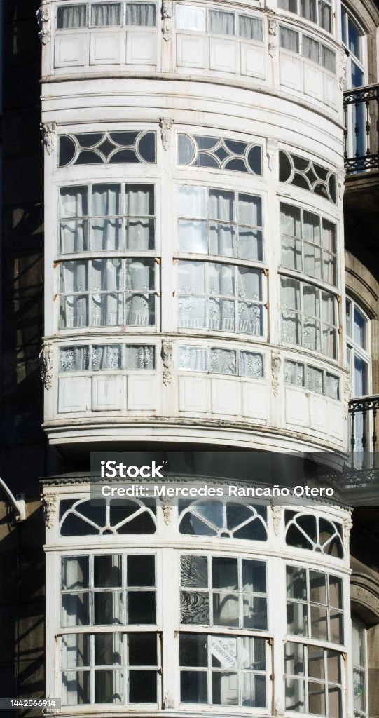 Galería, traditional glass facade detail, La Coruña city, Galicia, Spain Galería, traditional glass facade detail, curve corner, A Coruña city, Galicia, Spain A Coruna Stock Photo