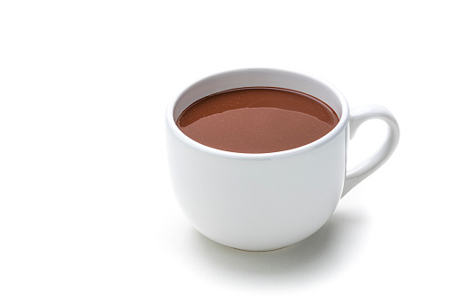 Sweet food: close up view of a hot chocolate mug isolated on white background. High resolution 42Mp studio digital capture taken with Sony A7rII and Sony FE 90mm f2.8 macro G OSS lens