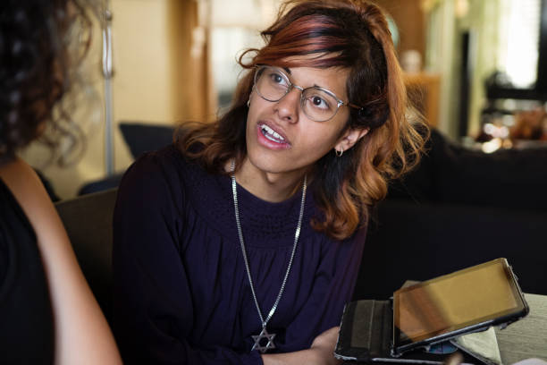 istock Transgender and non-binary teen friends doing homework. 1442569921