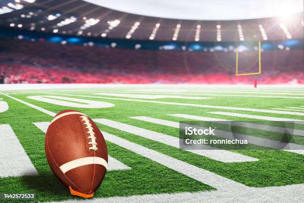 American Football Field Goal Post With Ball On Kicking Tee Stock Photo - Download Image Now
