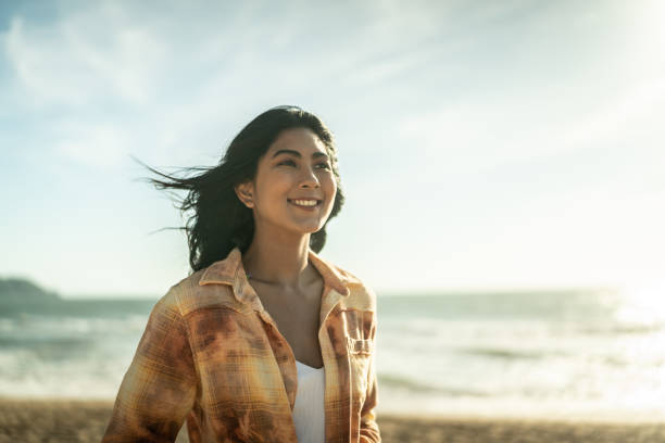 istock Young women contemplating at the beach 1442574180