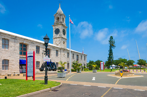 Royal Naval Dockyard, Bermuda- May 22, 2022 -  A store directory is displayed outside the entrance of the Clocktower Mall in Sandys, Bermuda, listing several interesting shops and stores for visiting tourists to shop.