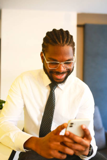 istock american black young man making phone call in office 1442593759