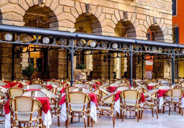 istock typical italian sidewalk cafe - restaurant 1442597678