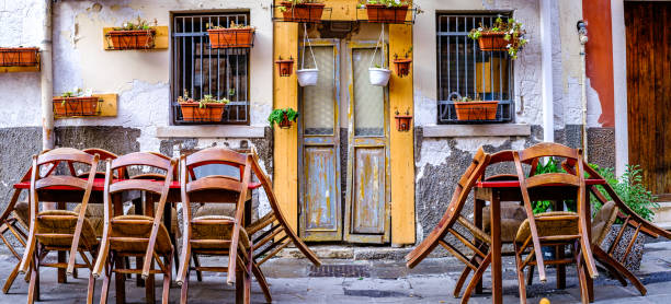 istock typical italian sidewalk cafe - restaurant 1442597696