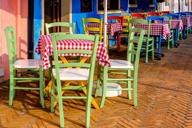istock typical italian sidewalk cafe - restaurant 1442597717