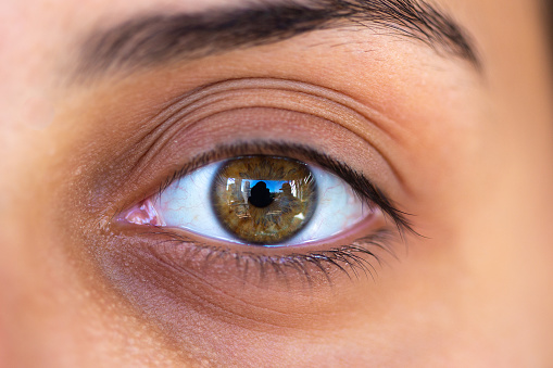 Female eye photographed with macro lens.