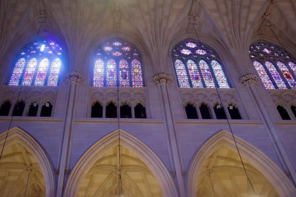 istock st patrick's cathedral stained glass windows central naive looking up at ribbed vaults horizontal 1442604887