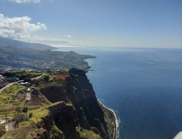 Cape Girão is a high cliff located on the south coast of the island of Madeira, in the Portuguese archipelago of Madeira. stock photo