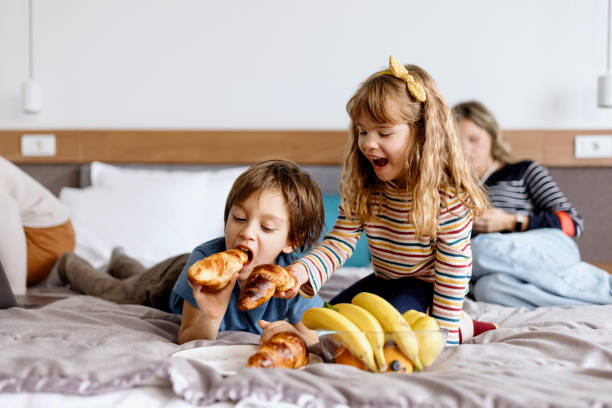 Family in the hotel room, vacation, travel concept