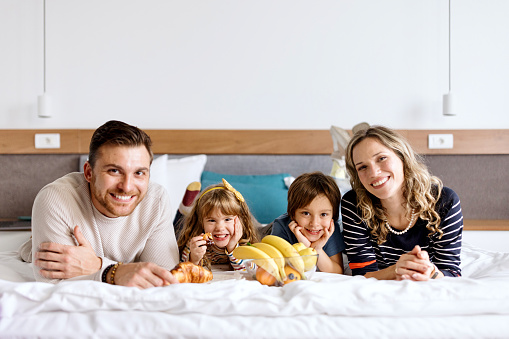 Family in the hotel room, vacation, travel concept