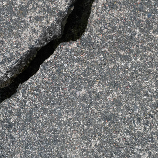 istock Old aged weathered cracked grey black tarmac texture pattern, large detailed damaged textured asphalt grungy background flat lay, vertical rough grained broken pattern macro closeup grunge copy space 1442612117