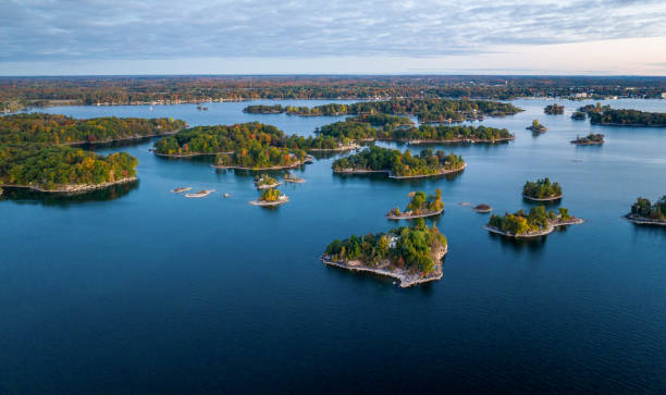 Small islands, trees-Thousand Islands Small islands, trees-Thousand Islands kingston ontario photos stock pictures, royalty-free photos & images