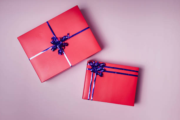 istock Present Gifts Nicely presented on background for celebration occasions gift bag and present box and ribbon 1442616935