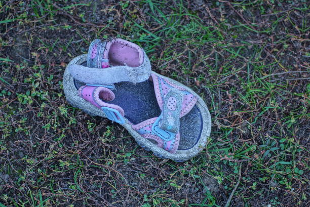 istock one small old dirty colored summer sandal t 1442623544