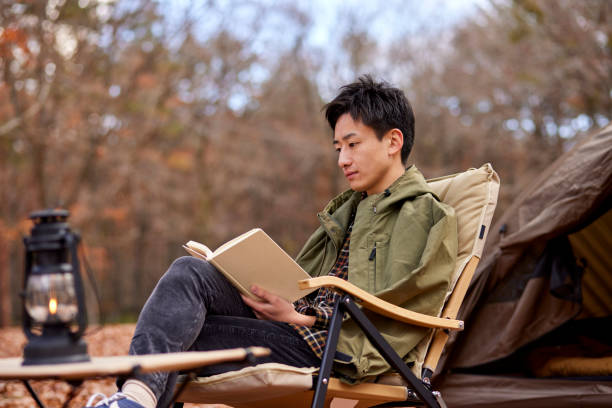 istock Japanese man enjoying camping 1442630445