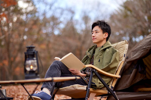 Japanese man enjoying camping