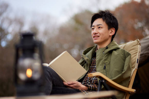 istock Japanese man enjoying camping 1442630467