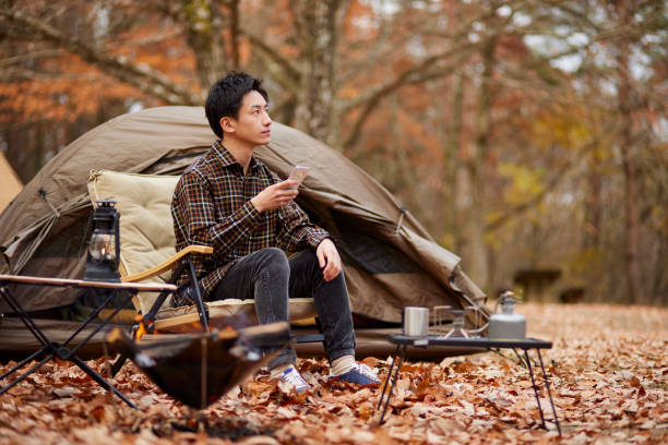 Japanese man enjoying camping