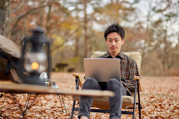 istock Japanese man enjoying camping 1442630525
