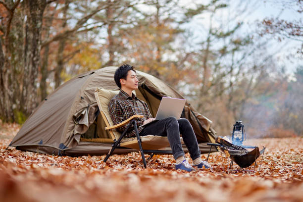 istock Japanese man enjoying camping 1442630537