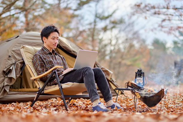 istock Japanese man enjoying camping 1442630539