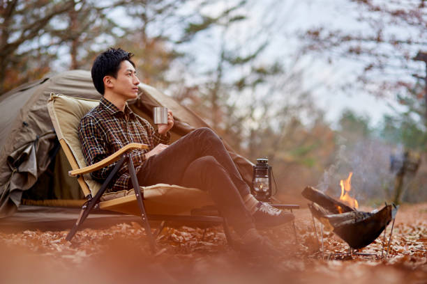 Japanese man enjoying camping