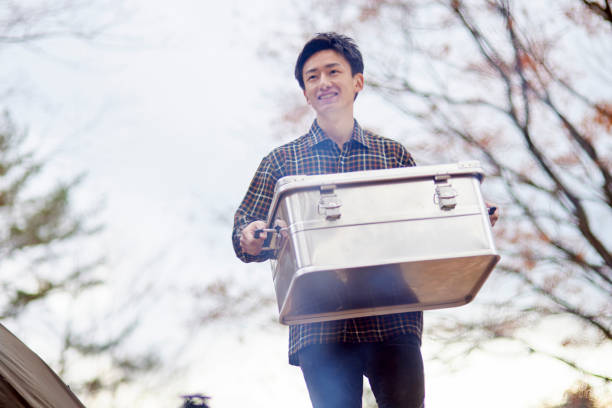 istock Japanese man enjoying camping 1442630666